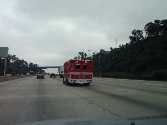 Passed by red ambulance on freeway 2/05/13 at 1:45 pm.
